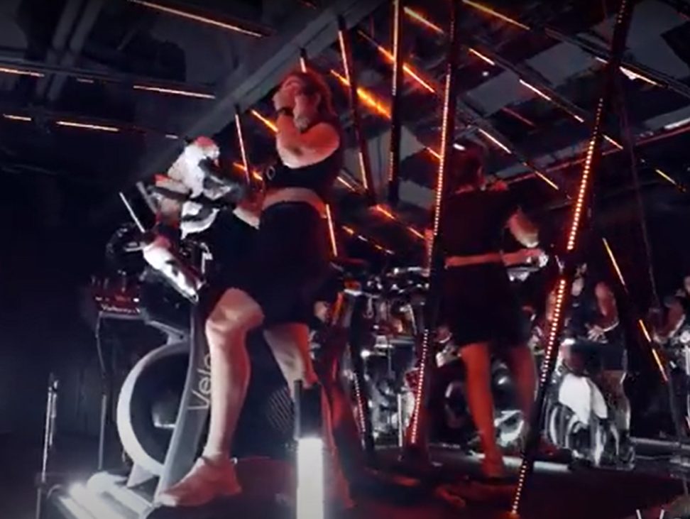 Colour-changing fitness lighting synced to class energy